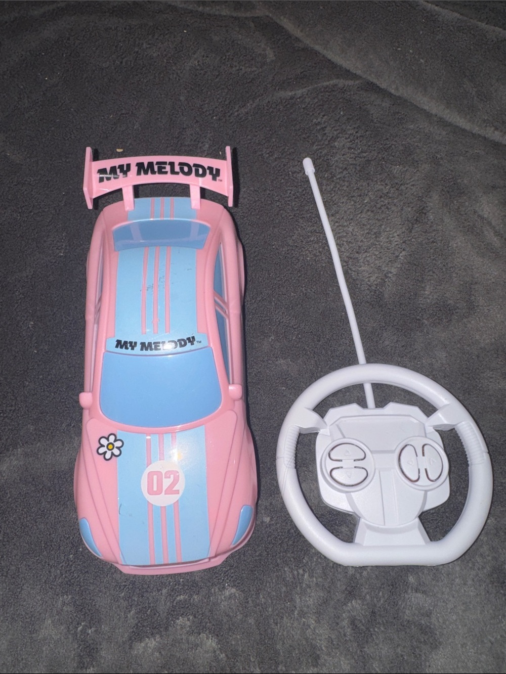 Used but works Sanrio My Melody Pink and Light Blue Remote Control Race Car